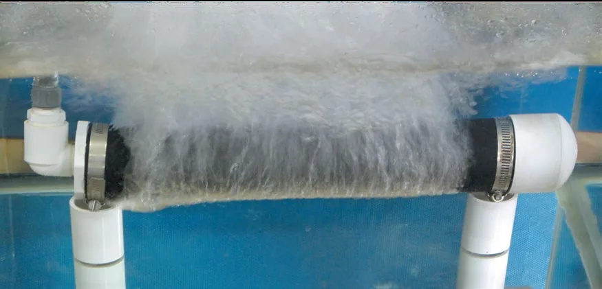 Slip-on tube diffuser membrane aerating in a water treatment tank